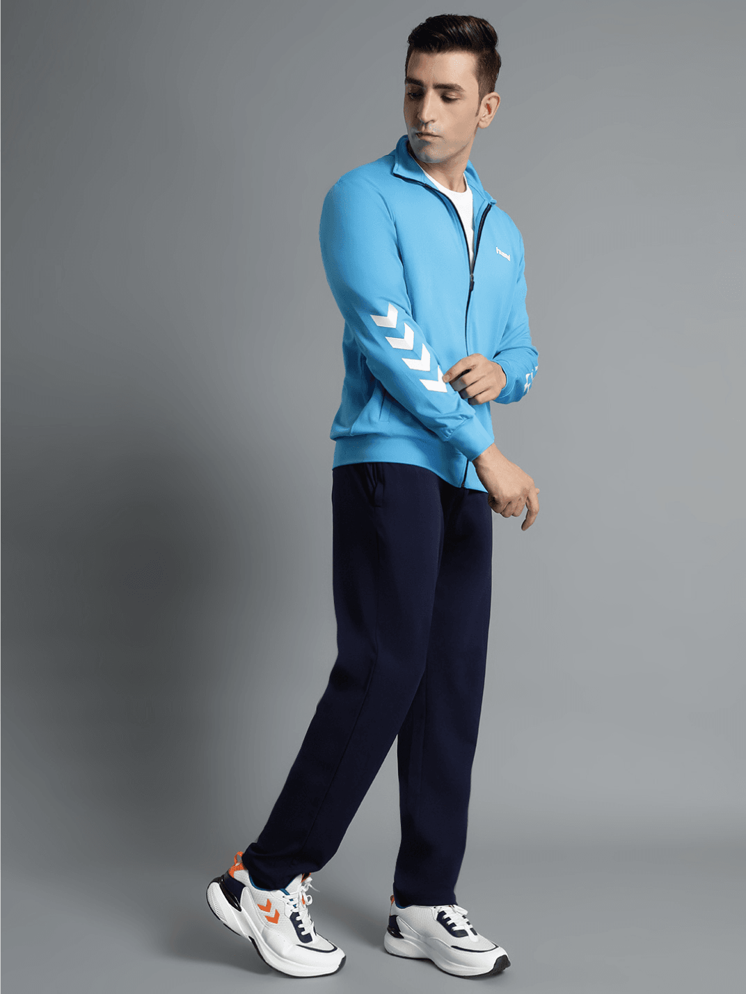 Promo All-Weather Polyester Tracksuit - Hummel India