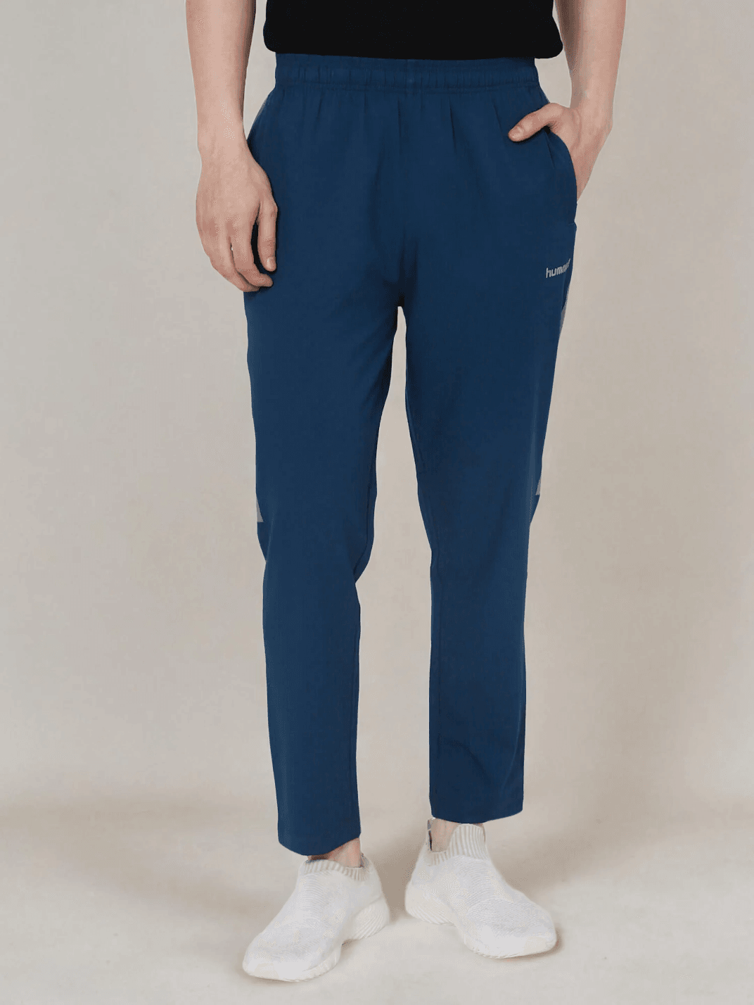Harold Solid Regular fit Polyester Trackpants for Men with zipper pockets Comfortable Breathable Fabric Stretchable for Everyday Use Ideal for Yoga Training Gym Running or Performance - Hummel India