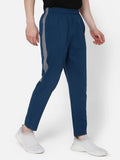 Harold Solid Regular fit Polyester Trackpants for Men with zipper pockets Comfortable Breathable Fabric Stretchable for Everyday Use Ideal for Yoga Training Gym Running or Performance - Hummel India
