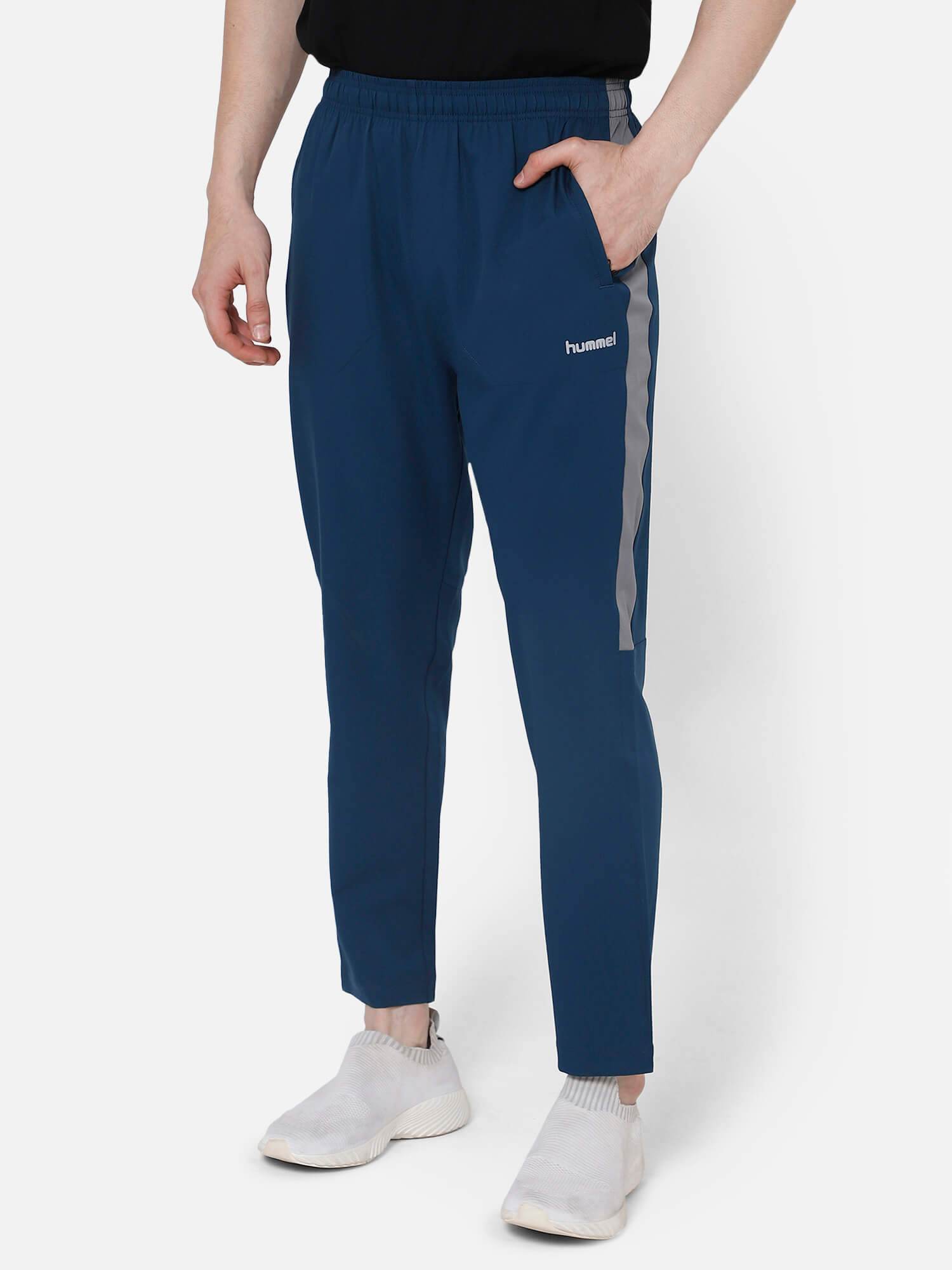 Harold Solid Regular fit Polyester Trackpants for Men with zipper pockets Comfortable Breathable Fabric Stretchable for Everyday Use Ideal for Yoga Training Gym Running or Performance - Hummel India