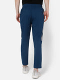 Harold Solid Regular fit Polyester Trackpants for Men with zipper pockets Comfortable Breathable Fabric Stretchable for Everyday Use Ideal for Yoga Training Gym Running or Performance - Hummel India