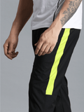 Harold Solid Regular fit Polyester Trackpants for Men with zipper pockets Comfortable Breathable Fabric Stretchable for Everyday Use Ideal for Yoga Training Gym Running or Performance - Hummel India