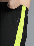 Harold Solid Regular fit Polyester Trackpants for Men with zipper pockets Comfortable Breathable Fabric Stretchable for Everyday Use Ideal for Yoga Training Gym Running or Performance - Hummel India