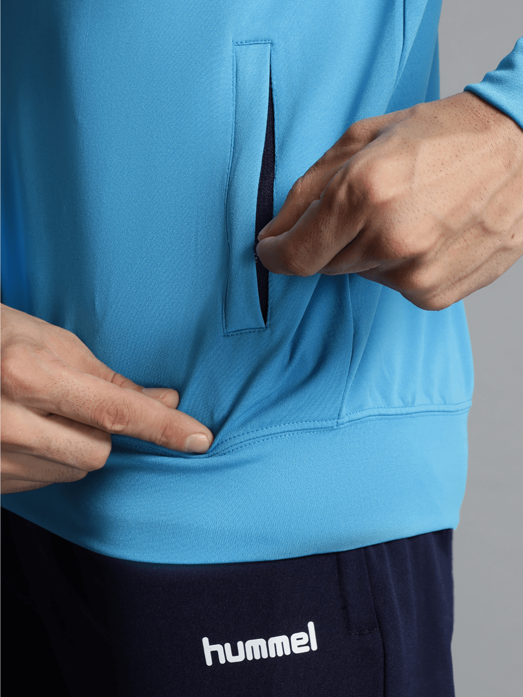 Promo All-Weather Polyester Tracksuit - Hummel India