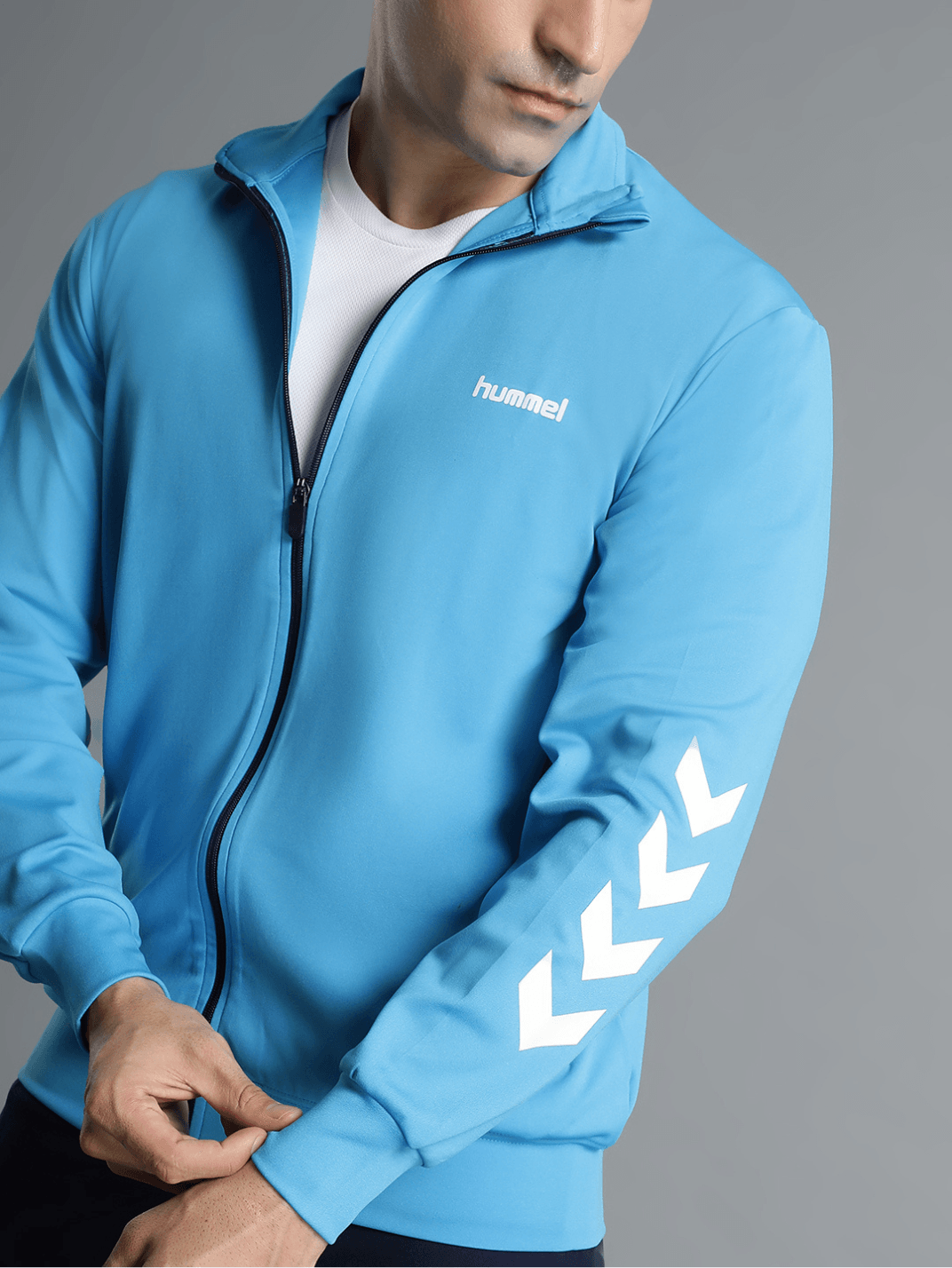 Promo All-Weather Polyester Tracksuit - Hummel India